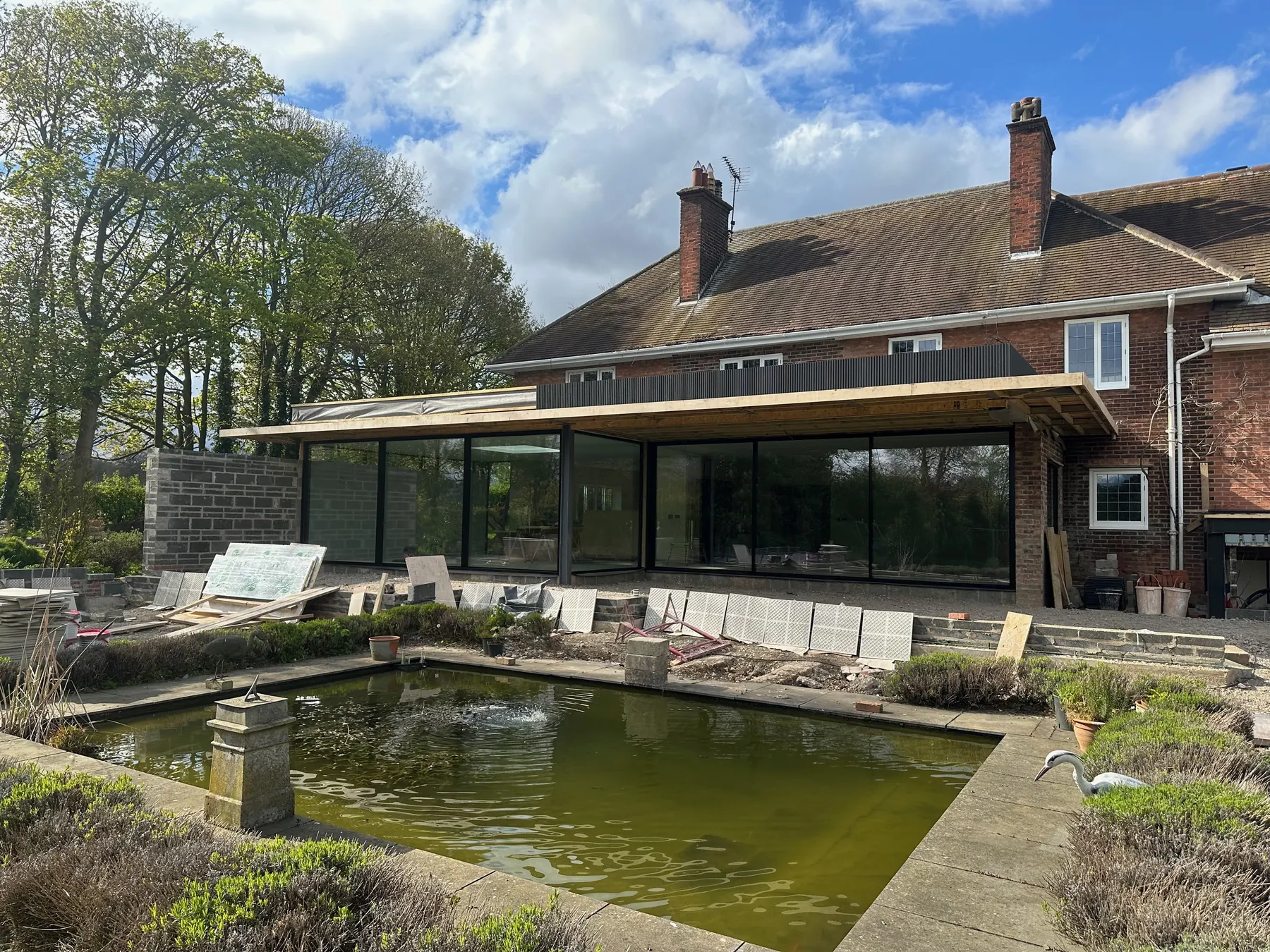 PM Windows installation: Wide glazing beside a landscaped garden