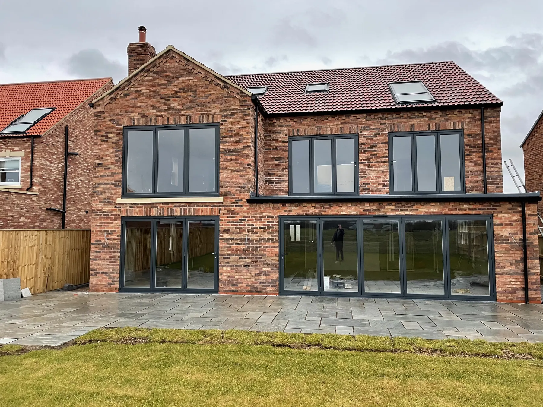 PM Windows installation: Bi-fold doors across a characterful rear elevation