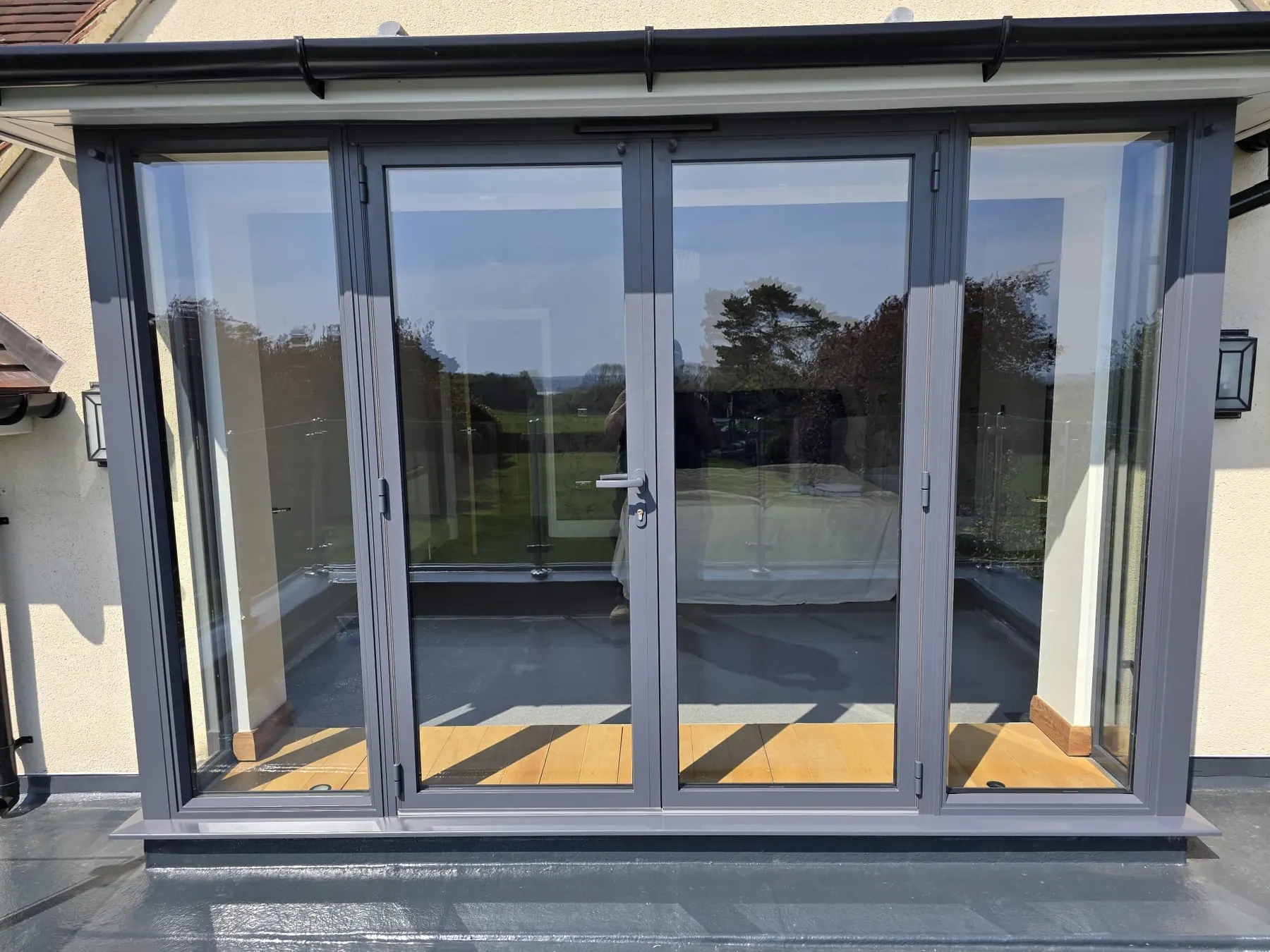 PM Windows installation: French doors opening a bright extension